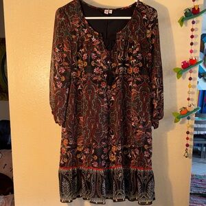 NWOT sheer, black, multi-colored paisley print mini dress with a tiered skirt, k